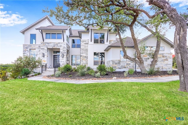 view of front of home featuring a front lawn