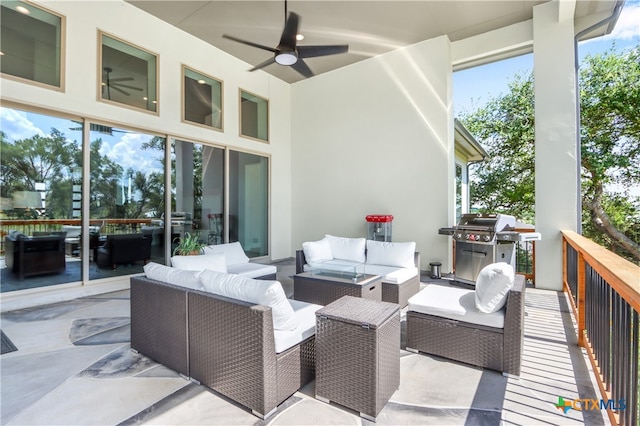 view of patio with ceiling fan, grilling area, and an outdoor hangout area