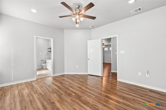 7917 Purvis St, Temple, TX 76502 - unfurnished bedroom with wood finished floors, recessed lighting, connected bathroom, and ceiling fan