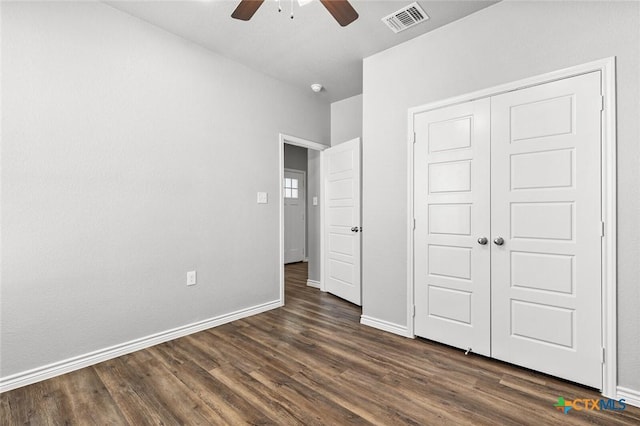 7917 Purvis St, Temple, TX 76502 - unfurnished bedroom with dark wood-style flooring, a closet, and ceiling fan