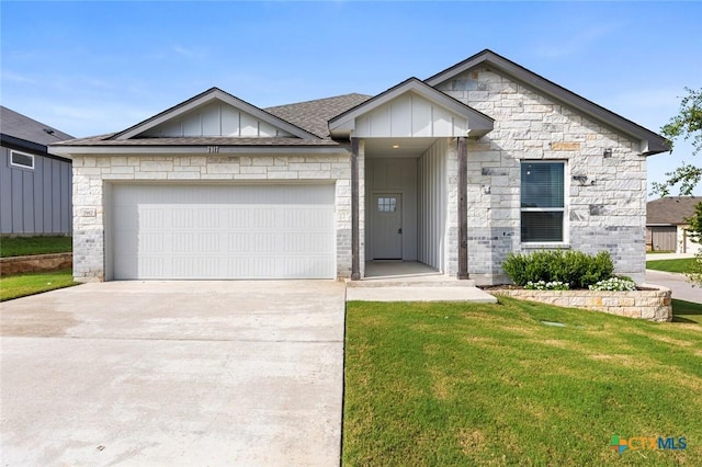 7917 Purvis St, Temple, TX 76502 - ranch-style house featuring an attached garage, concrete driveway, a front yard, and board and batten siding