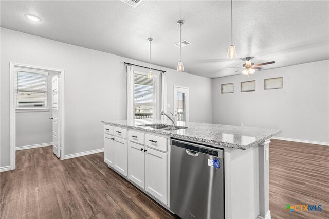 7917 Purvis St, Temple, TX 76502 - kitchen with dishwasher, dark wood-style floors, a ceiling fan, a kitchen island with sink, and hanging light fixtures