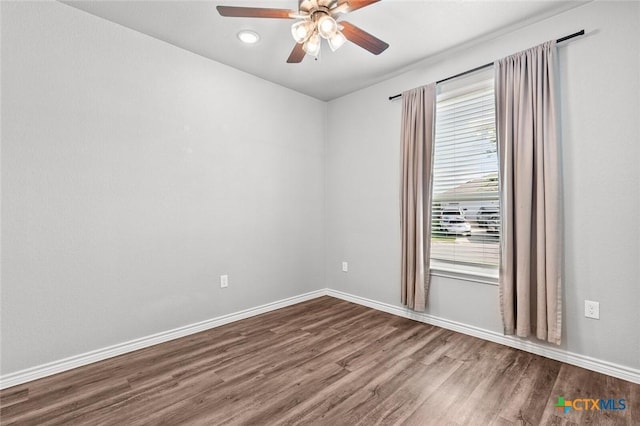 7917 Purvis St, Temple, TX 76502 - spare room featuring dark wood-type flooring and ceiling fan