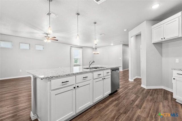 7917 Purvis St, Temple, TX 76502 - kitchen featuring stainless steel dishwasher, dark wood-style floors, white cabinetry, and recessed lighting