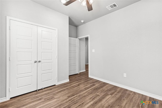 7917 Purvis St, Temple, TX 76502 - unfurnished bedroom with wood finished floors, a closet, and ceiling fan