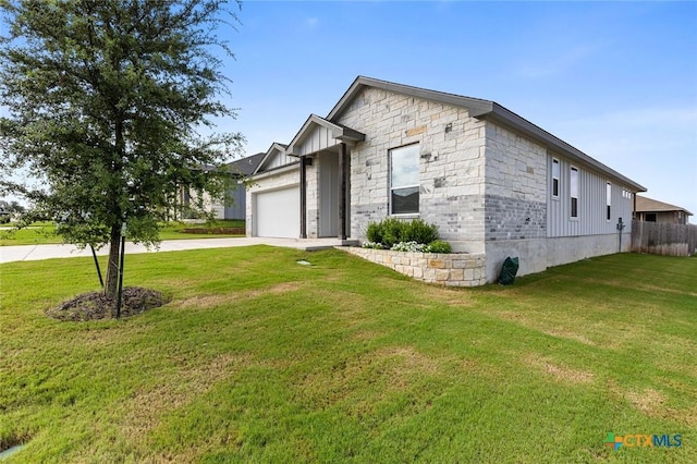 7917 Purvis St, Temple, TX 76502 - view of side of property with an attached garage, concrete driveway, and board and batten siding