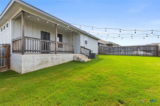7917 Purvis St, Temple, TX 76502 - back of property with board and batten siding and a fenced backyard