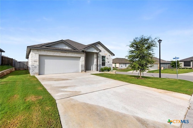 7917 Purvis St, Temple, TX 76502 - single story home featuring concrete driveway, board and batten siding, an attached garage, and stone siding
