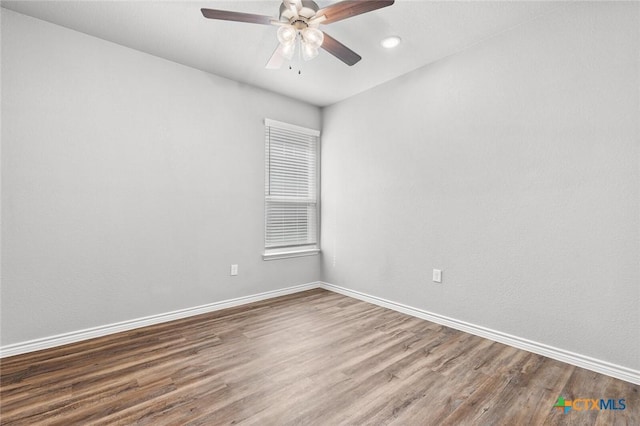 7917 Purvis St, Temple, TX 76502 - empty room featuring wood finished floors, a ceiling fan, and recessed lighting