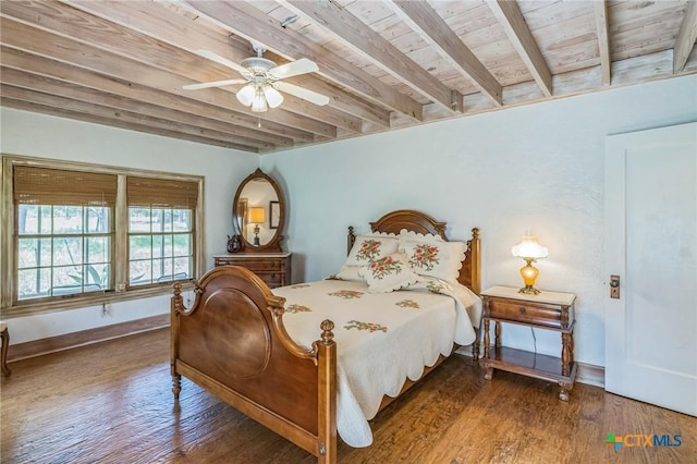 959 Highland Dr, Bandera, TX 78003 - bedroom featuring a wood ceiling with exposed beams, wood finished floors, and ceiling fan