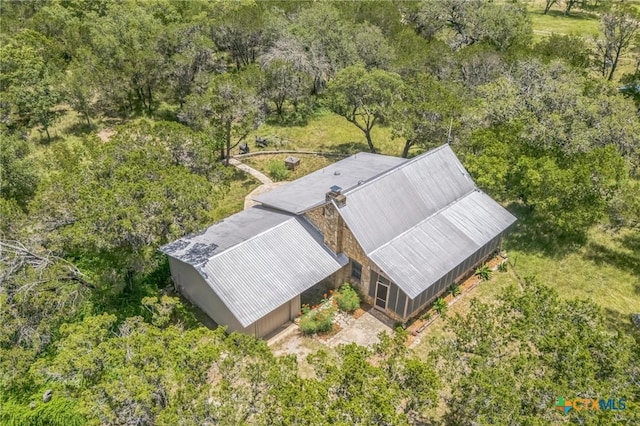 959 Highland Dr, Bandera, TX 78003 - view from above of property with a heavily wooded area