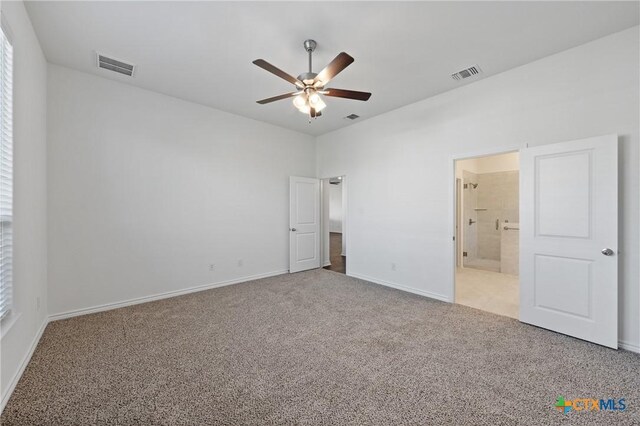 7308 Caladium Dr, Temple, TX 76502 - unfurnished bedroom featuring carpet floors, baseboards, connected bathroom, and ceiling fan