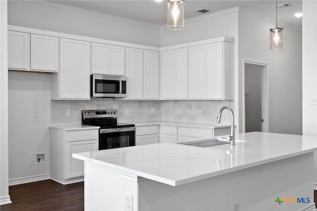 kitchen featuring white cabinets, sink, stainless steel appliances, and hanging light fixtures