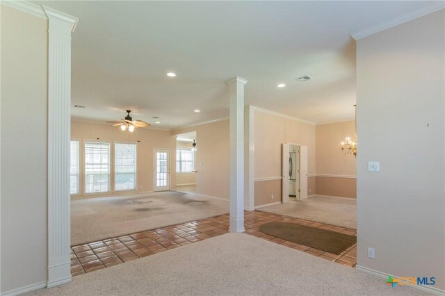 empty room featuring tile patterned floors, ornamental molding, ceiling fan with notable chandelier, recessed lighting, and carpet flooring