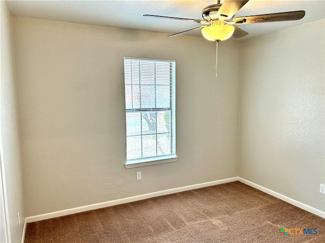 unfurnished room featuring carpet flooring and ceiling fan