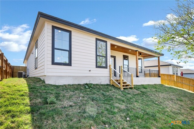 9923 Loma Alta Cir, Converse, TX 78109 - rear view of property with a porch