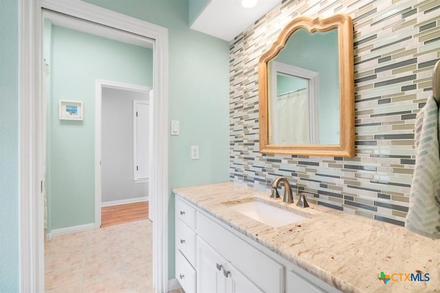 10306 Vance Circle Rd, Jonestown, TX 78645 - bathroom featuring vanity and decorative backsplash