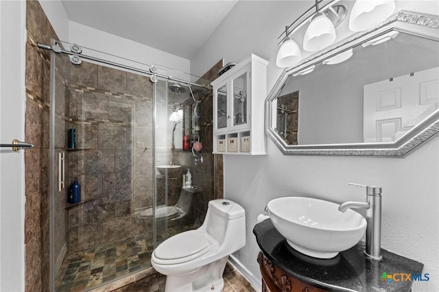 1546 W Fm 93rd Hwy Unit 207, Temple, TX 76502 - bathroom featuring a stall shower, toilet, and vanity