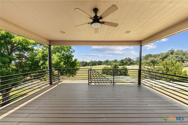 1546 W Fm 93rd Hwy Unit 207, Temple, TX 76502 - deck with a ceiling fan and view of scattered trees