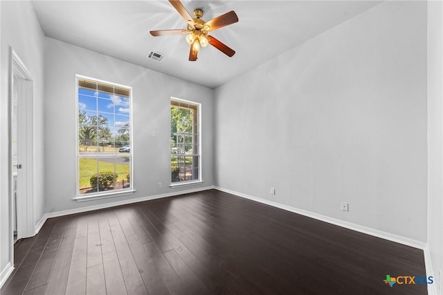 1546 W Fm 93rd Hwy Unit 207, Temple, TX 76502 - empty room with dark wood-style floors, baseboards, and a ceiling fan