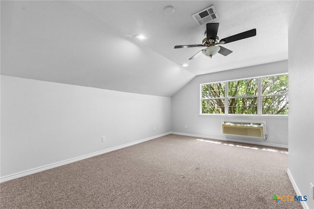 1546 W Fm 93rd Hwy Unit 207, Temple, TX 76502 - bonus room featuring lofted ceiling, baseboards, a wall unit AC, carpet floors, and a ceiling fan