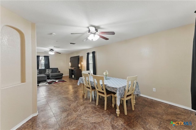7611 Presidio Crk, Boerne, TX 78015 - tiled dining space featuring a ceiling fan and baseboards