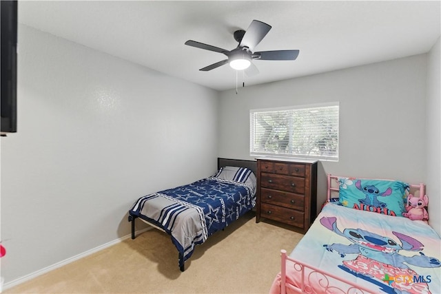 7611 Presidio Crk, Boerne, TX 78015 - bedroom with carpet flooring, a ceiling fan, and baseboards