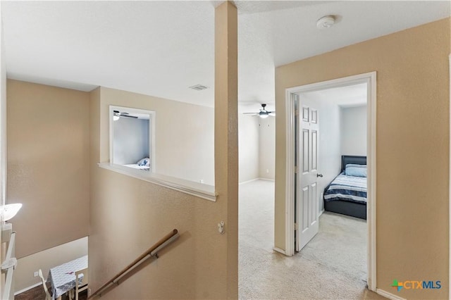 7611 Presidio Crk, Boerne, TX 78015 - hall with carpet, an upstairs landing, and visible vents