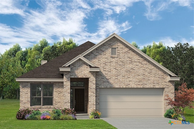 view of front of home featuring a front lawn and a garage