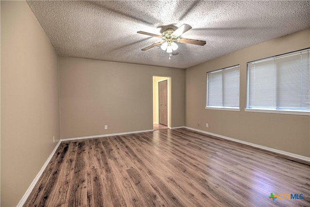 2006 Canyon Creek Dr, Temple, TX 76502 - unfurnished room with a ceiling fan, a textured ceiling, and wood finished floors