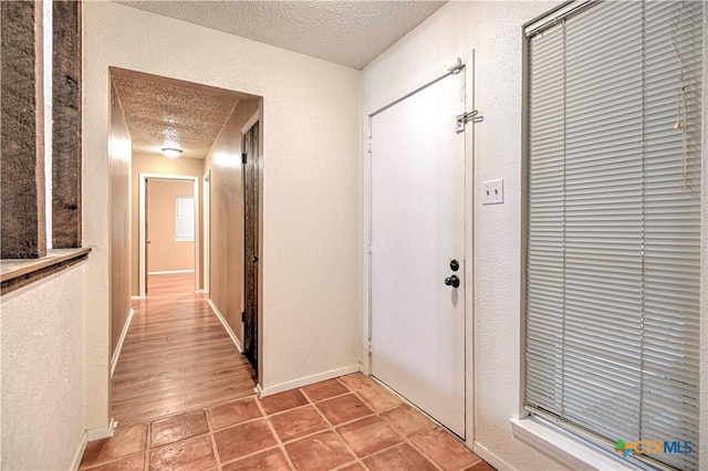 2006 Canyon Creek Dr, Temple, TX 76502 - corridor featuring a textured ceiling and a textured wall