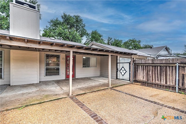 2006 Canyon Creek Dr, Temple, TX 76502 - back of house featuring a chimney and a patio area