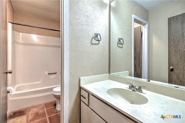 2006 Canyon Creek Dr, Temple, TX 76502 - full bath with a textured ceiling, a textured wall, vanity, tub / shower combination, and tile patterned flooring