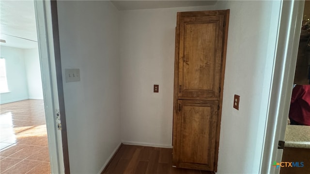 hallway featuring hardwood / wood-style flooring