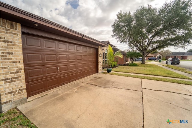 206 Ashland Crk, Victoria, TX 77901 - garage with concrete driveway