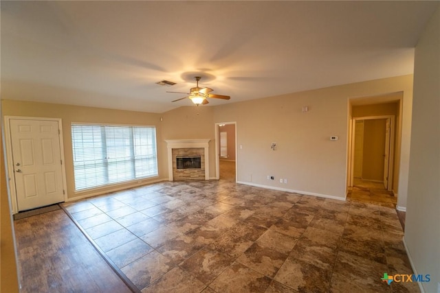 206 Ashland Crk, Victoria, TX 77901 - unfurnished living room with a ceiling fan and a fireplace