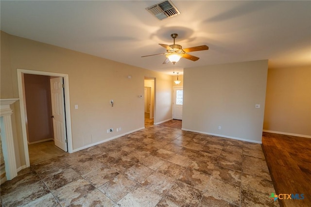 unfurnished room featuring ceiling fan and hardwood / wood-style floors