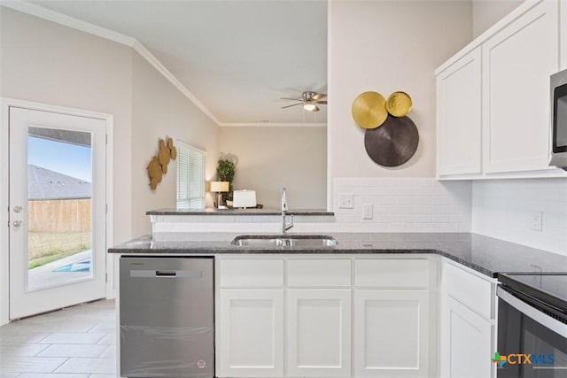 1306 Campbelton Dr, Temple, TX 76504 - kitchen with a sink, ornamental molding, stainless steel dishwasher, and dark stone countertops
