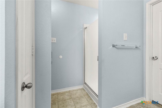 full bathroom with a shower stall