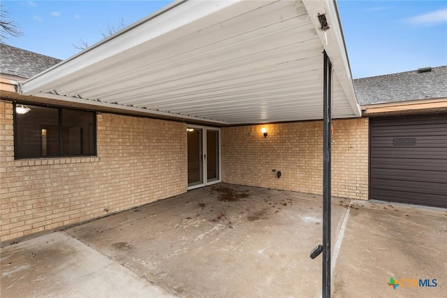 view of patio / terrace featuring a carport