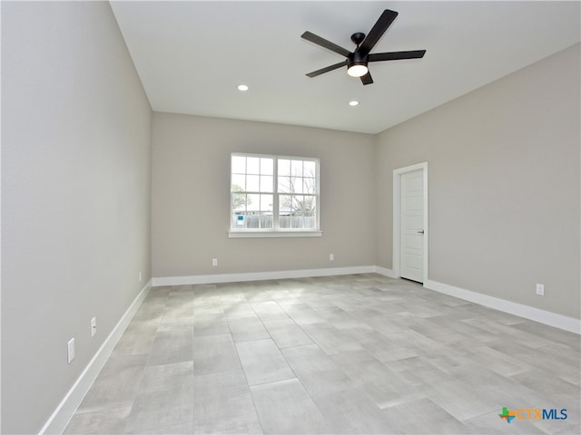 spare room featuring ceiling fan