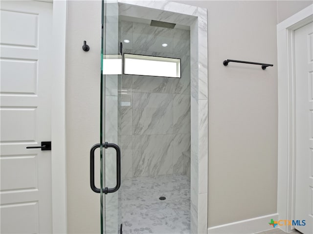 bathroom featuring walk in shower