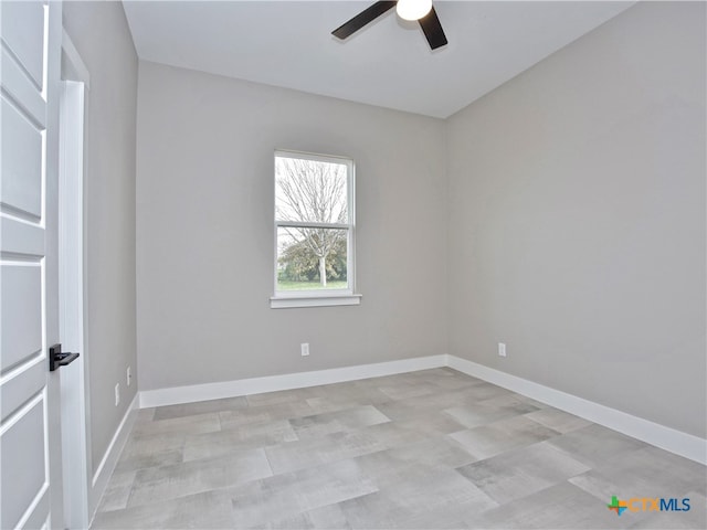 unfurnished room with ceiling fan