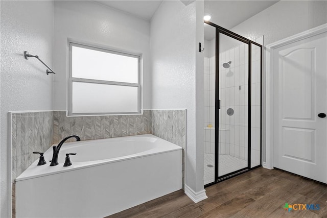 730 Eagle Pass Dr, Salado, TX 76571 - bathroom with plus walk in shower and wood-type flooring