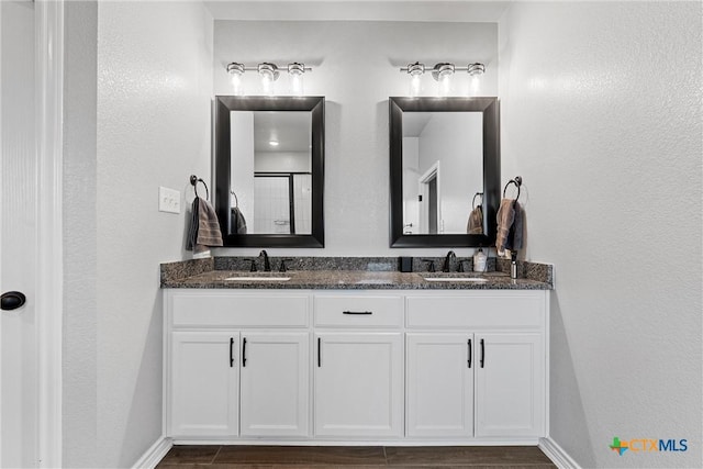 730 Eagle Pass Dr, Salado, TX 76571 - bathroom featuring vanity and wood-type flooring