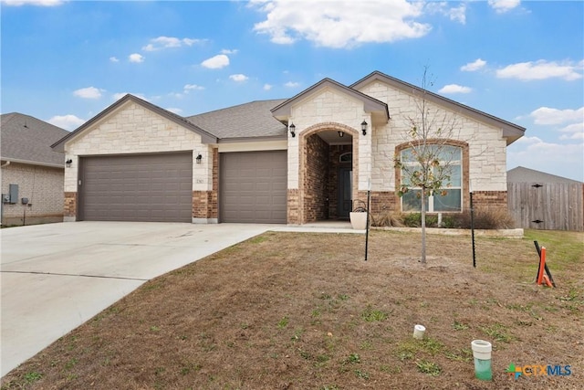 730 Eagle Pass Dr, Salado, TX 76571 - view of front of home featuring a front yard and a garage