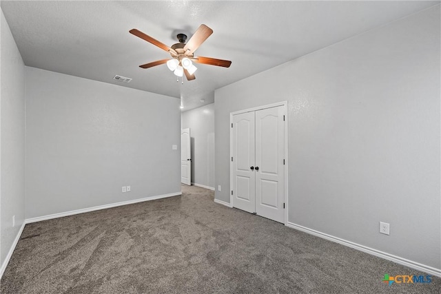 730 Eagle Pass Dr, Salado, TX 76571 - unfurnished bedroom with ceiling fan, carpet flooring, and a closet