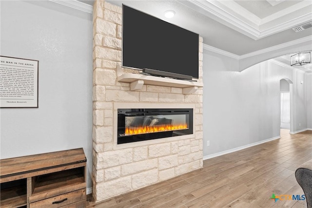 730 Eagle Pass Dr, Salado, TX 76571 - living room with a fireplace, ornamental molding, and hardwood / wood-style flooring