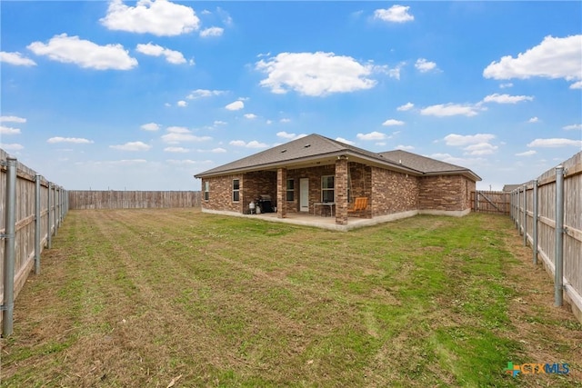 730 Eagle Pass Dr, Salado, TX 76571 - rear view of property featuring a yard and a patio area