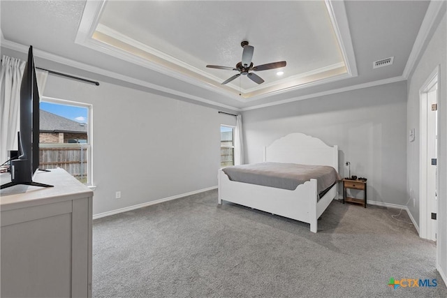 730 Eagle Pass Dr, Salado, TX 76571 - bedroom featuring ornamental molding, light colored carpet, ceiling fan, and a raised ceiling